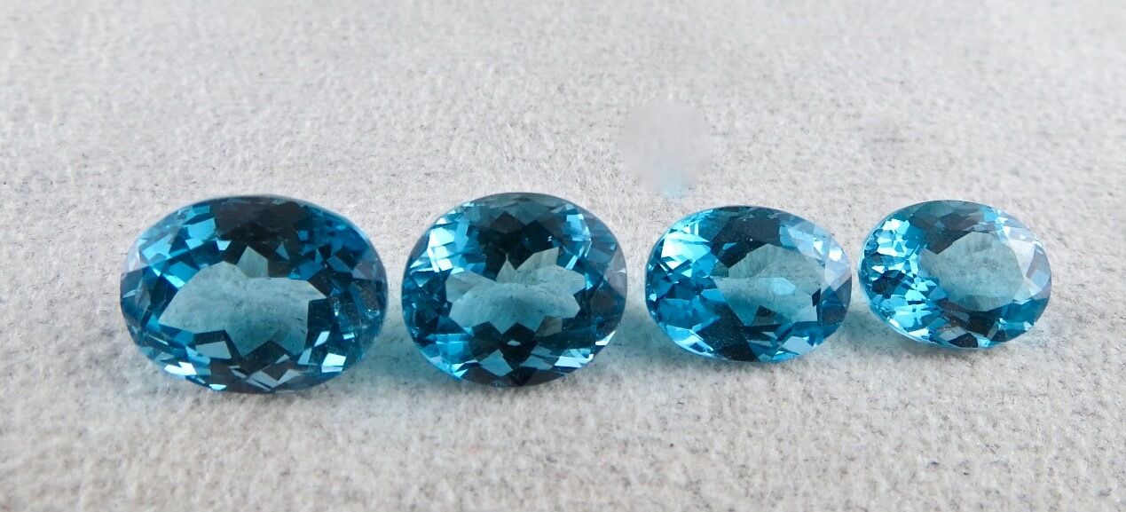 FINEST BLUE TOPAZ OVAL CUT 4 PCS 38.75 CARATS GEMSTONE FOR PENDANT EARRING RING