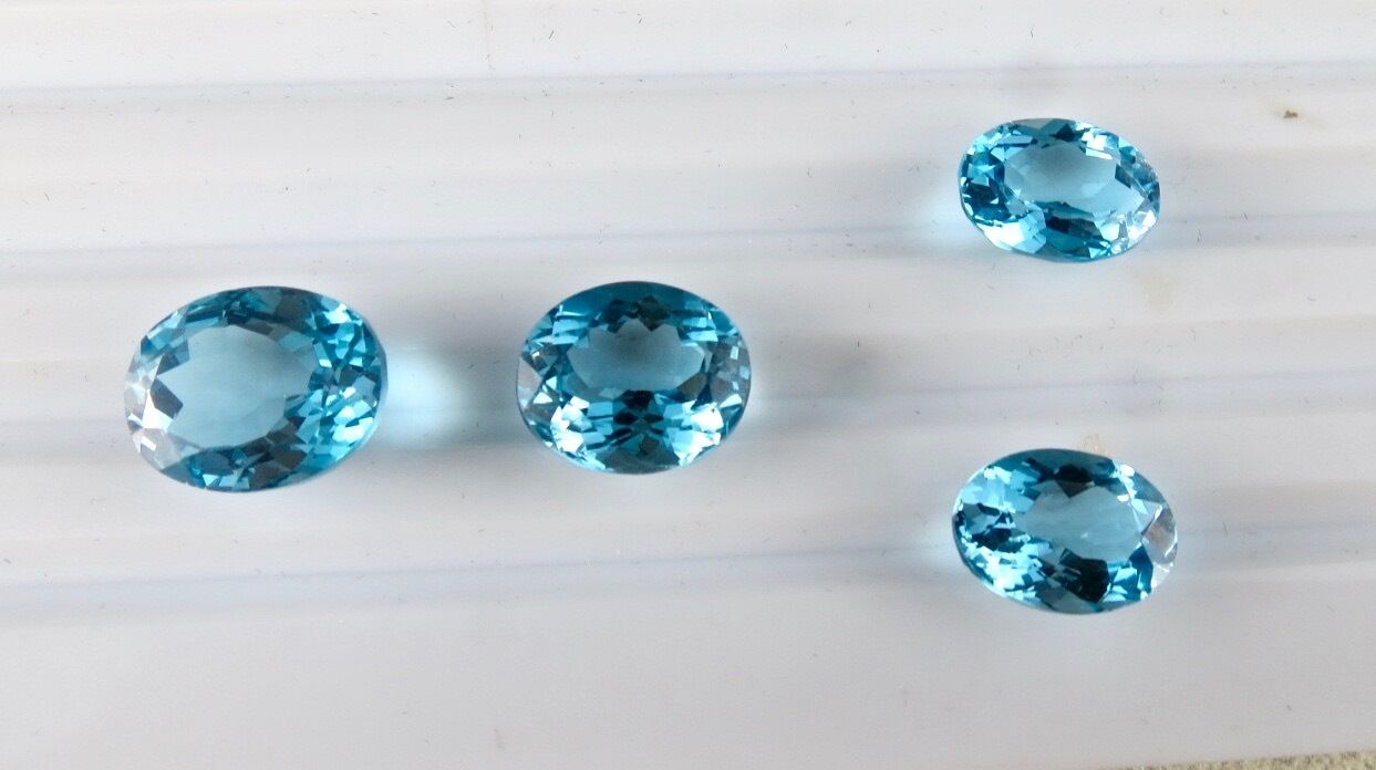 FINEST BLUE TOPAZ OVAL CUT 4 PCS 38.75 CARATS GEMSTONE FOR PENDANT EARRING RING