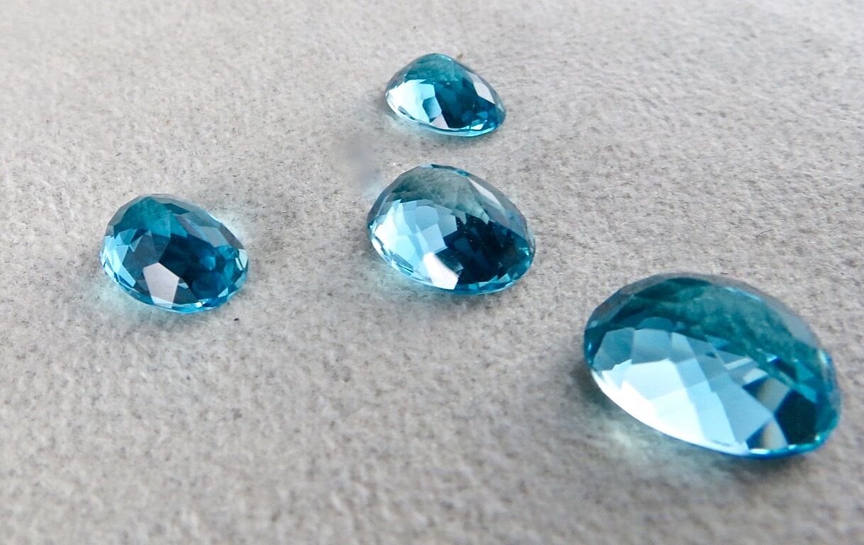 FINEST BLUE TOPAZ OVAL CUT 4 PCS 38.75 CARATS GEMSTONE FOR PENDANT EARRING RING