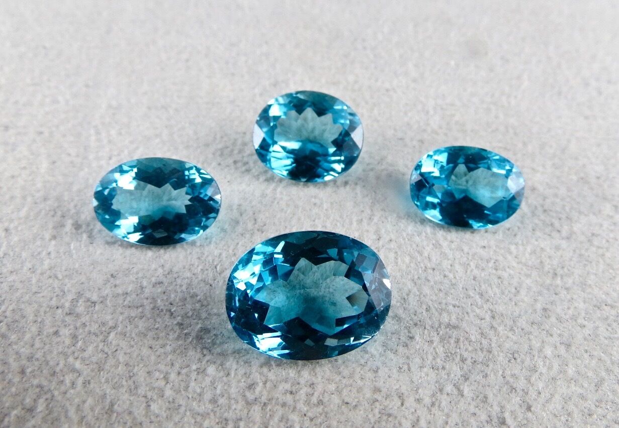 FINEST BLUE TOPAZ OVAL CUT 4 PCS 38.75 CARATS GEMSTONE FOR PENDANT EARRING RING