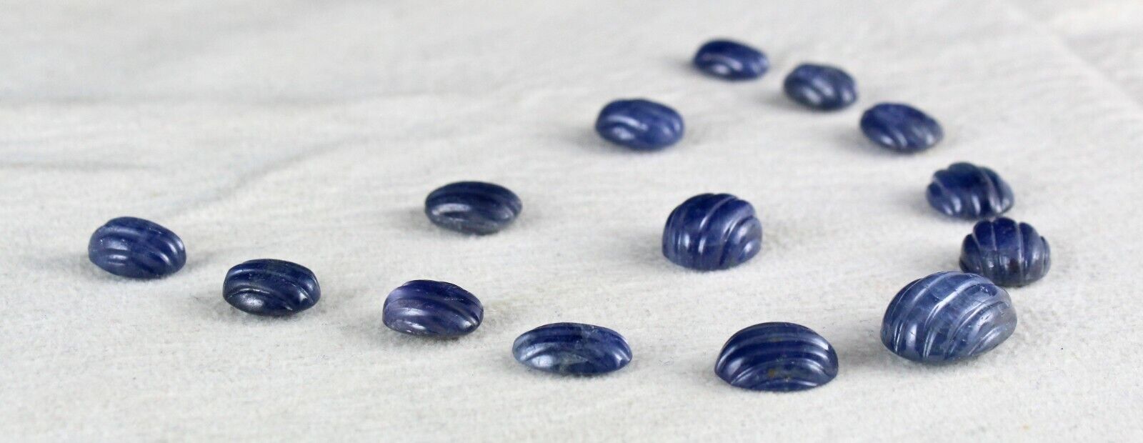 Natural Untreated Blue Sapphire Carved Oval Gemstone 14 Pcs 65.60 Cts Design Set