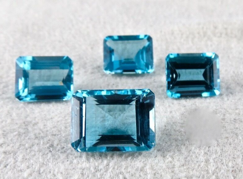 BLUE TOPAZ OCTAGON CUT 4 PCS 28.9 CARATS GEMSTONES FOR PENDANT EARRING RING SET