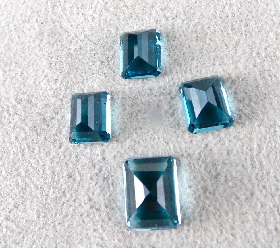 BLUE TOPAZ OCTAGON CUT 4 PCS 28.9 CARATS GEMSTONES FOR PENDANT EARRING RING SET