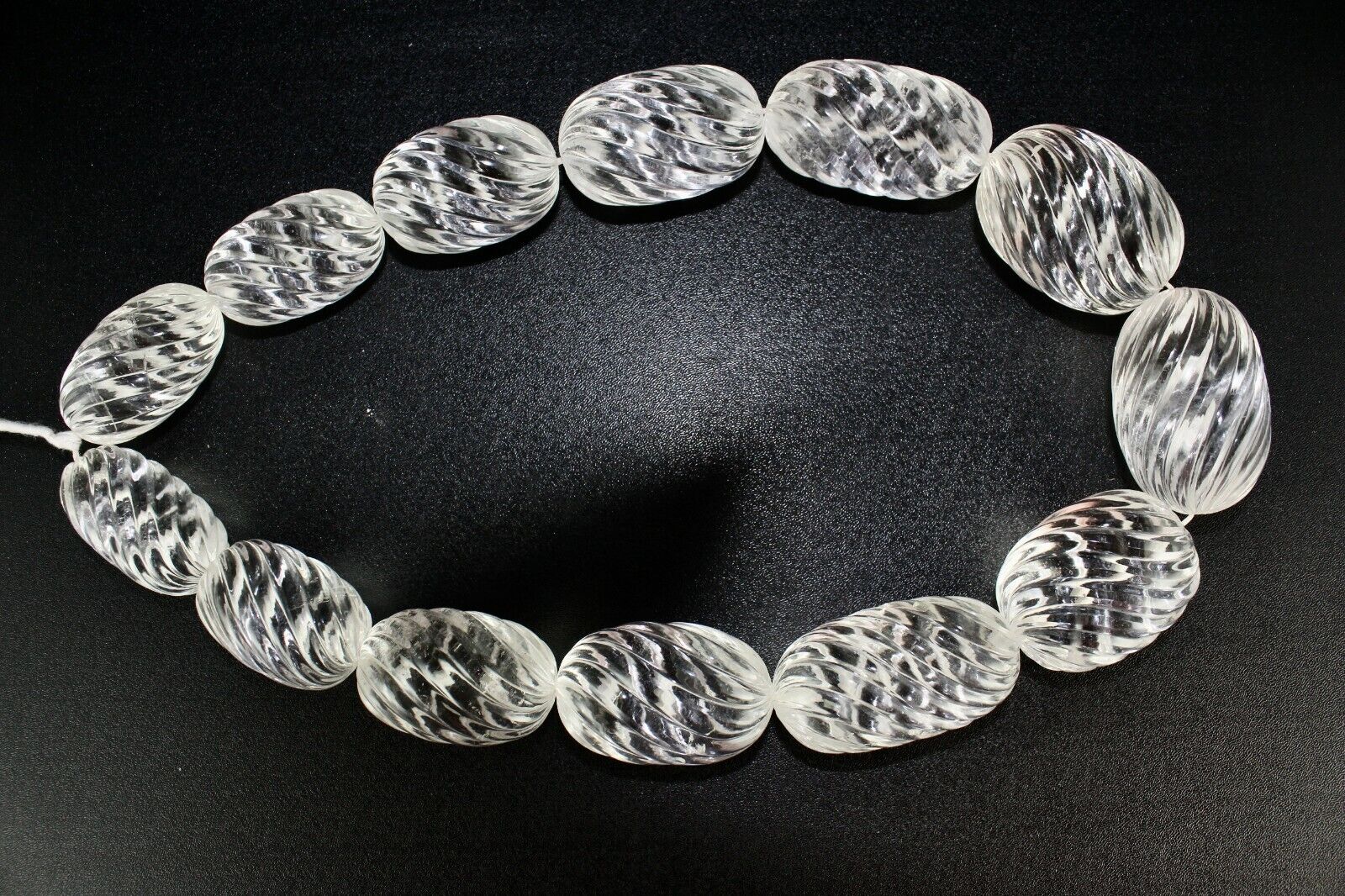 NATURAL WHITE ROCK CRYSTAL QUARTZ CARVED OVAL BEADS 13 PCS 3725 CARATS GEMSTONE